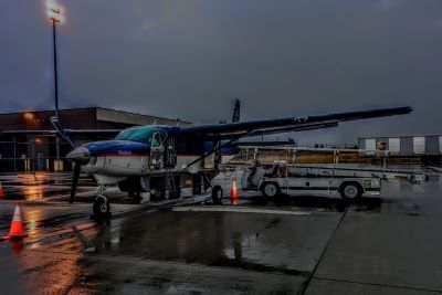 Image of C208 aircraft in the rain